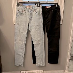 2 pairs boys size 12 REG Levi’s. 502 Regular Taper jeans. 1 light blue & 1 black